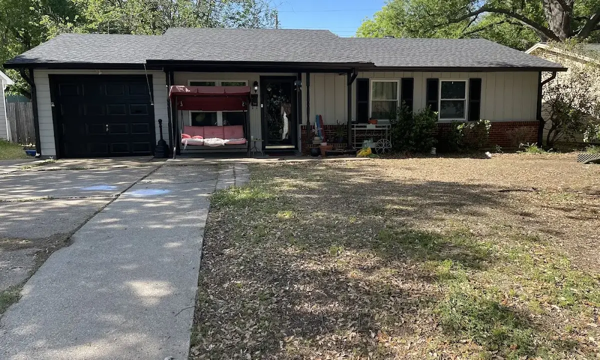 Asphalt Shingle Roof Repair crew at work on a residential roof in Wilmington Island